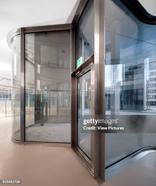 Steel frame of entrance door. Novartis Campus Virchow 6, Basel, Switzerland. Architect: Alvaro Siza, 2012.