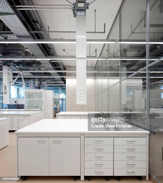 Filing system in open plan office. Novartis Campus Virchow 6, Basel, Switzerland. Architect: Alvaro Siza, 2012.