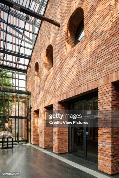 The Malopolska Garden of Arts, Krakow, Poland. Architect: Ingarden & Ewy Architects, 2012. Main inside facade of theater building with shadows...