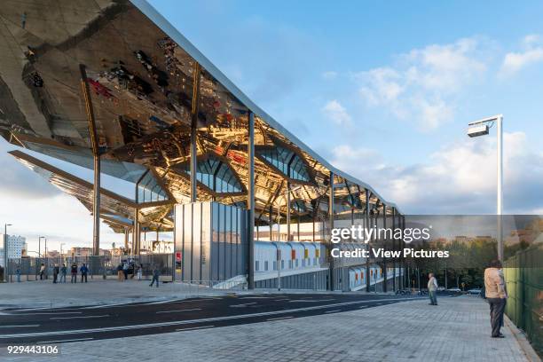 Perspective on slope of market canopy and street. Encants Bellcaire Flea Market, Barcelona, Spain. Architect: b720 Fermín Vázquez Arquitectos, 2013.