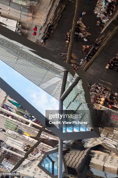 Detail showing reflective soffit. Encants Bellcaire Flea Market, Barcelona, Spain. Architect: b720 Fermín Vázquez Arquitectos, 2013.