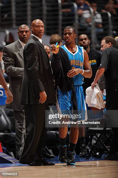 Head Coach Byron Scott and Chris Paul of the New Orleans Hornets look on against the Los Angeles Clippers at Staples Center on November 9, 2009 in...