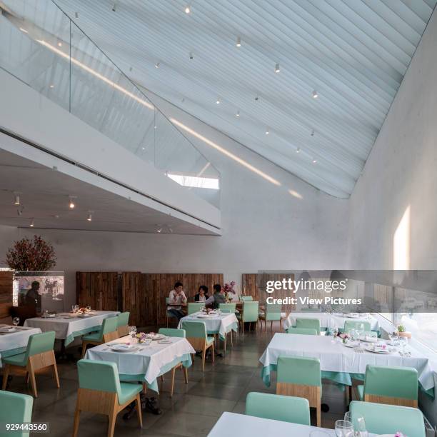 Restaurant interior with louvred skylight and gallery. Songwon Art Center / Bien-etre Restaurant, Seoul, Korea, South. Architect: Mass Studies, 2012.