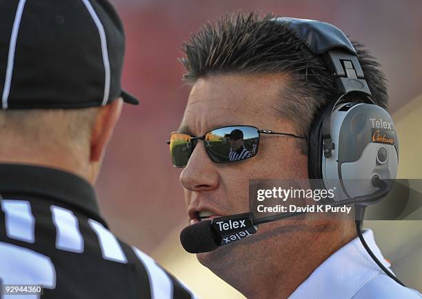 Head coach Mike Gundy of the Oklahoma State Cowboys speaks to an official during the game against the Iowa State Cyclones at Jack Trice Stadium on...