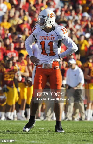 Quarterback Zac Robinson of the Oklahoma State Cowboys looks on during the game against the Iowa State Cyclones at Jack Trice Stadium on November 7,...