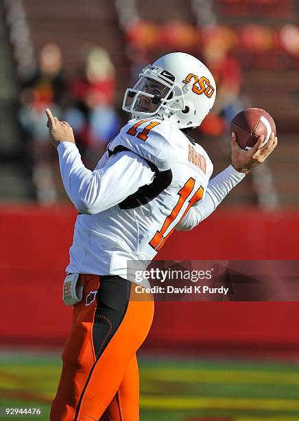 Quarterback Zac Robinson of the Oklahoma State Cowboys warms up before the game against the Iowa State Cyclones at Jack Trice Stadium on November 7,...