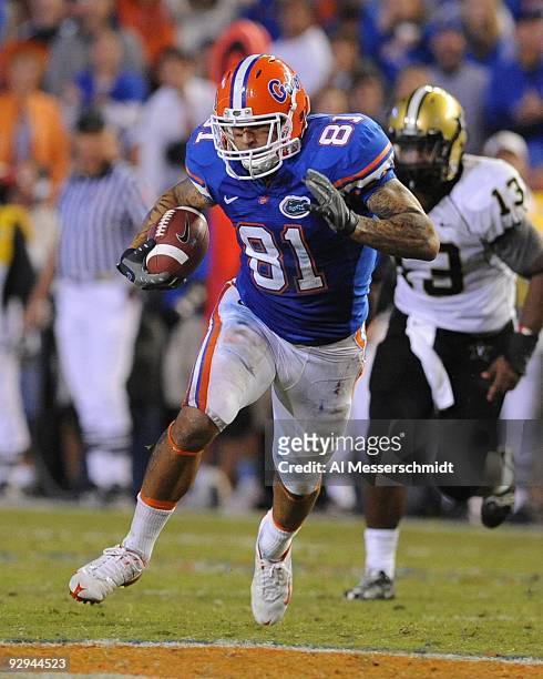 Tight end Aaron Hernandez of the Florida Gators grabs a pass against the Vanderbilt Commodores on November 7, 2009 at Ben Hill Griffin Stadium in...