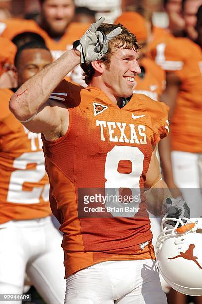 Wide receiver Jordan Shipley of the Texas Longhorns gives the "hook 'em horns" after breaking the school record for single game receiving yards with...