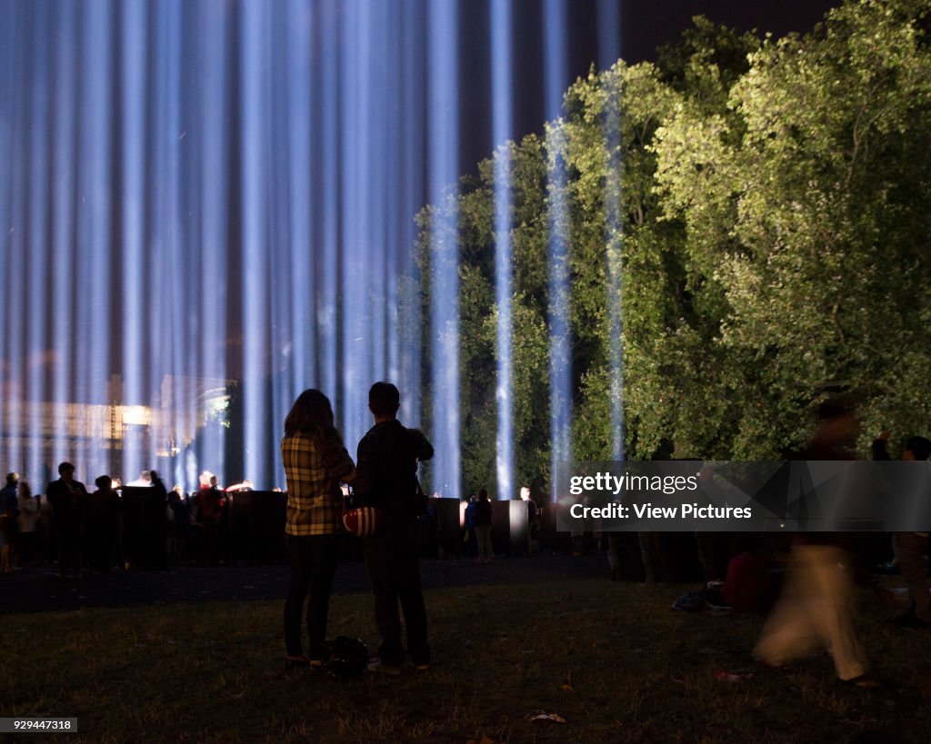 View from Victoria Tower Gardens with visitors. Spectra London, London, United Kingdom. Architect: Ryoji Ikeda, 2014.
