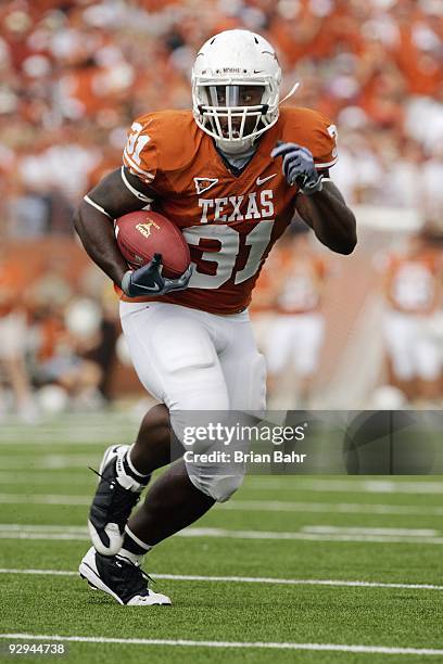 Running back Cody Johnson of the Texas Longhorns scores a touchdown against the UCF Knights on November 7, 2009 at Darrell K Royal - Texas Memorial...