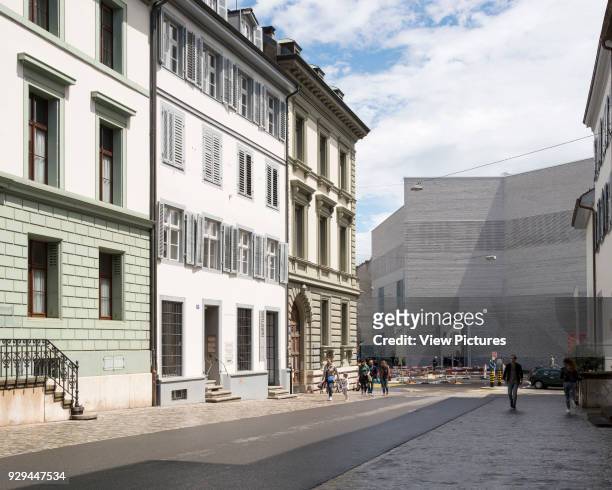 Exterior facade along street. Kunstmuseum Basel, Basel, Switzerland. Architect: Christ & Gantenbein, 2016.