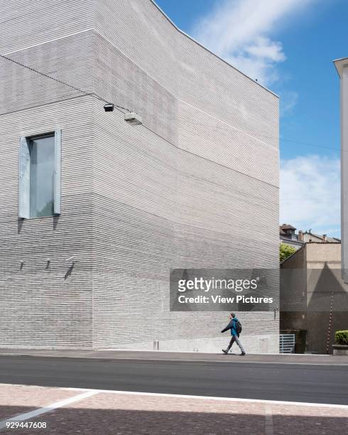 Exterior facade across street. Kunstmuseum Basel, Basel, Switzerland. Architect: Christ & Gantenbein, 2016.