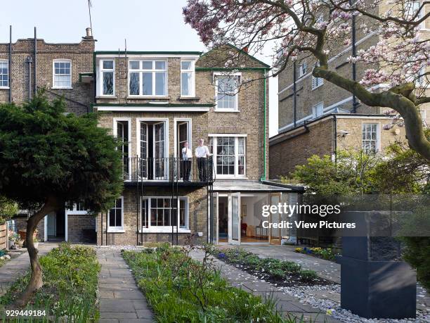 Rear elevation with garden. The Zen Centre, London, United Kingdom. Architect: Chassay Studio, 2015.
