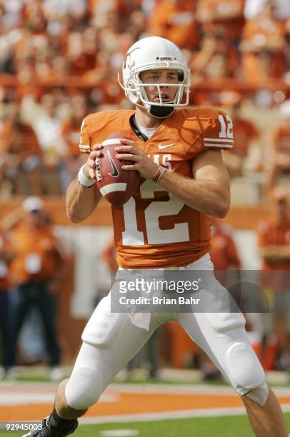 Quarterback Colt McCoy of the Texas Longhorns looks for his receiver against the UCF Knights on November 7, 2009 at Darrell K Royal - Texas Memorial...