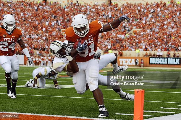 Running back Cody Johnson of the Texas Longhorns scores his second touchdown against the UCF Knights, a third down 13-yard run, on November 7, 2009...