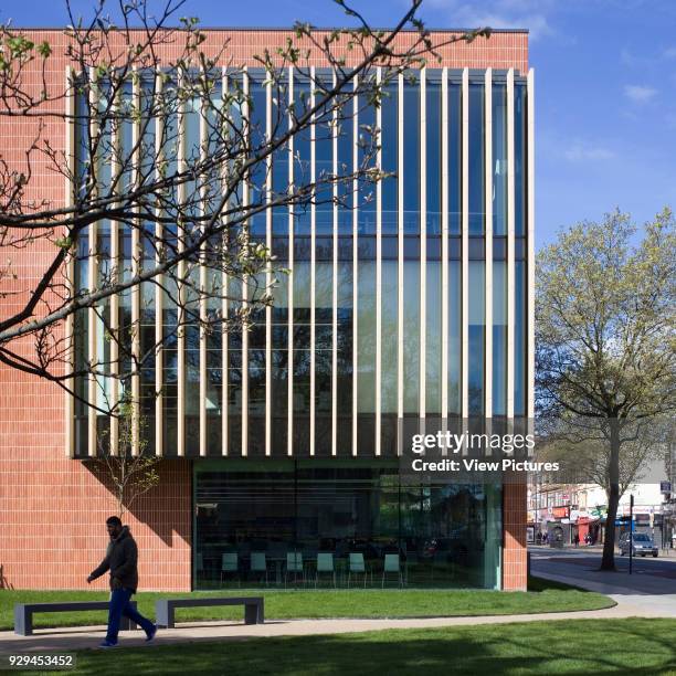 East Ham Library and Customer Service Centre, London, United Kingdom. Architect: Rick Mather Architects, 2014. Exterior view of East facade.