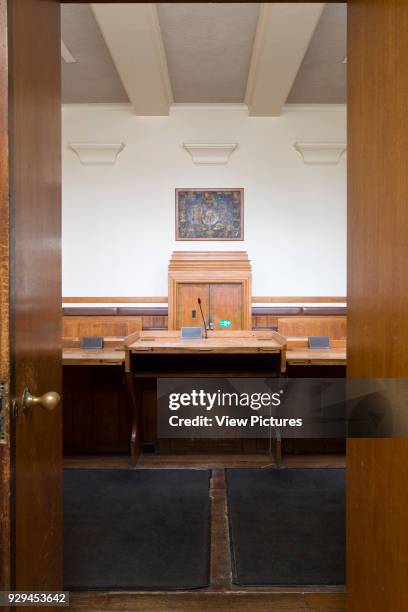 Kingston Magistrates Court, Kingston upon Thames, United Kingdom. Architect: unknown, 2014. View of Court Room 1 through doorway.