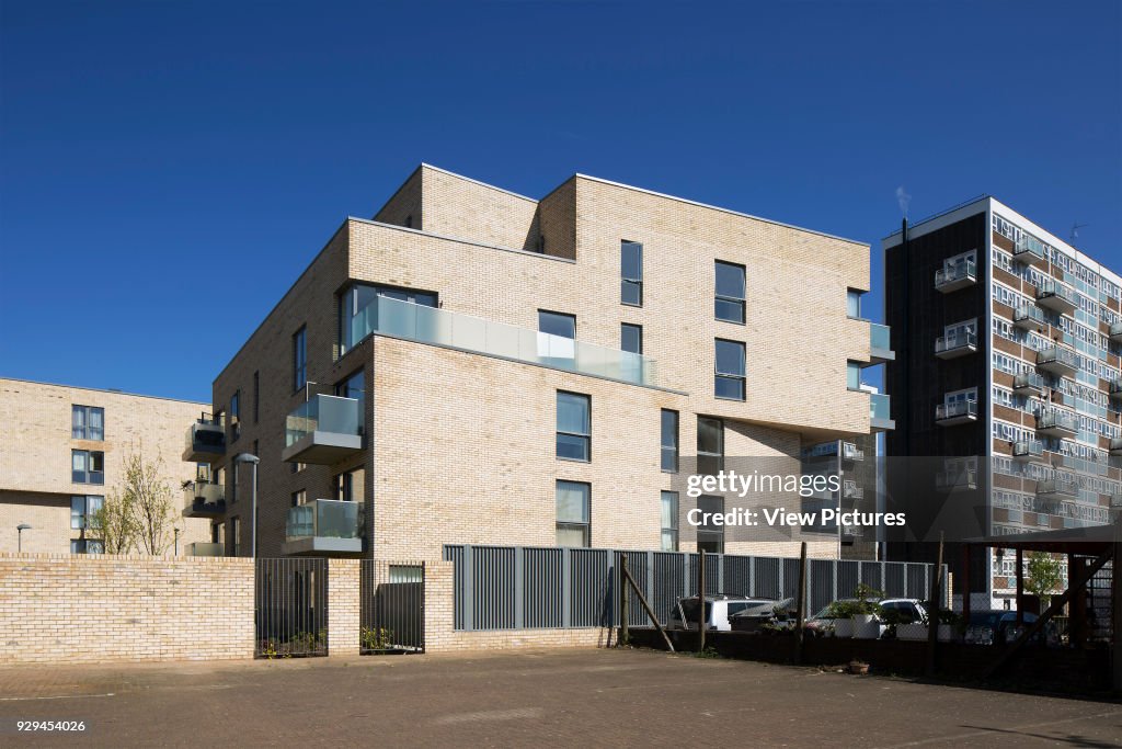 View of rear of housing scheme. Hicks Bolton Bond Housing Scheme, London, United Kingdom. Architect: Rick Mather Architects, 2015.