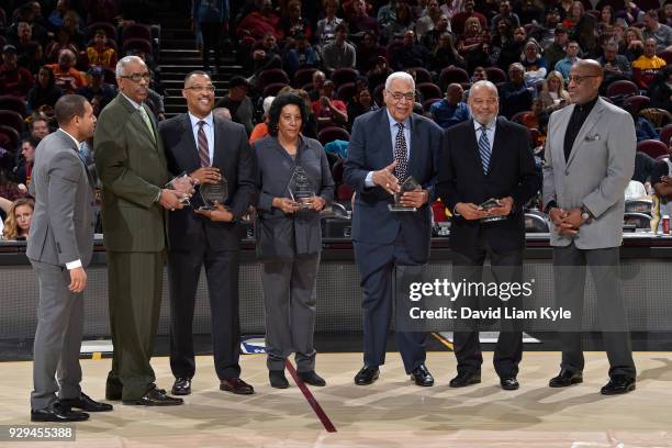 Bernie Bickerstaff, Wayne Embry, and Families of Nathaniel Clifton, Earl Lloyd and Chuck Cooper are honored during the game between the Cleveland...