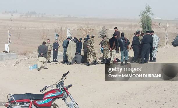 This photo taken on December 27, 2017 shows men gathering for a funeral of Afghan bomb disposal worker Bahadur Agha, who died while working in...