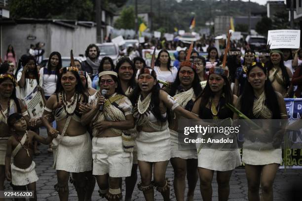 Indigenous women from the Waorani Amazonian community attend the International Women´s Day march on Atahualpa Street in Puyo, Ecuador on March 8,...