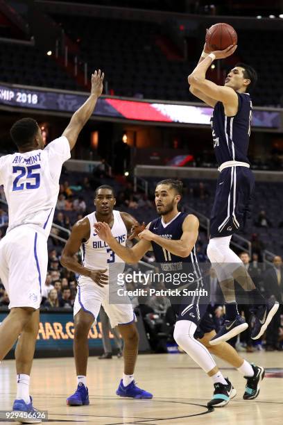 Yuta Watanabe of the George Washington Colonials shoots in front of Rashed Anthony of the Saint Louis Billikens during the first half in the Second...