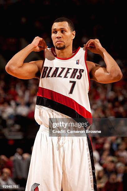 Brandon Roy of the Portland Trail Blazers adjusts his jersey during the game against the Houston Rockets on October 27, 2009 at the Rose Garden Arena...