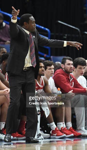 Georgia basketball coach Mark Fox gestures to his team during a Southeastern Conference Basketball Tournament game between Alabama and Texas A&M on...