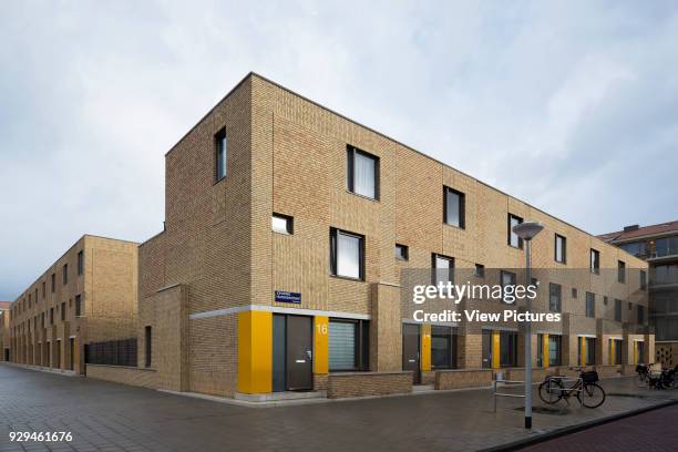 Three-quarter view of apartments on Johannes Hilverdinkstraat. Middengebied Noord Overtoomse Veld residences, Amsterdam, Netherlands. Architect: De...