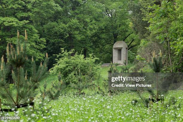 View through park towards pavilion. Koepel of de Overplaats, Heemstede, Netherlands. Architect: Inbo/Marjolein van Eig, 2013.