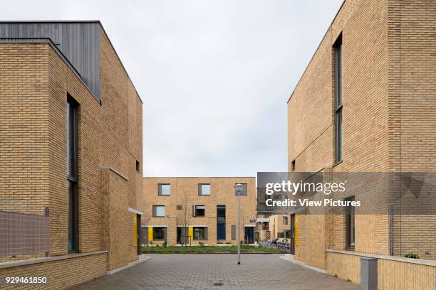 Elevational street-view looking towards Bart van der Leckplantsoen. Middengebied Noord Overtoomse Veld residences, Amsterdam, Netherlands. Architect:...