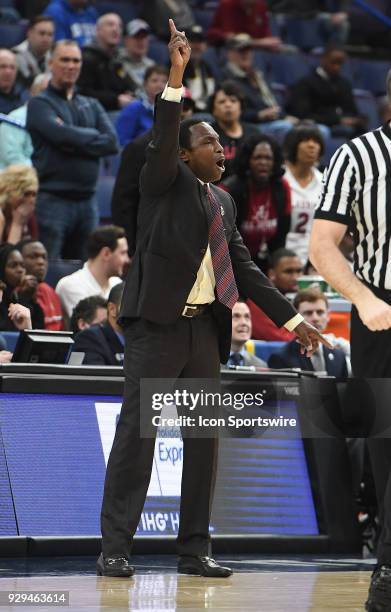 Alabama basketball coach Avery Johnson gestures to his team in the final minutes during a Southeastern Conference Basketball Tournament game between...