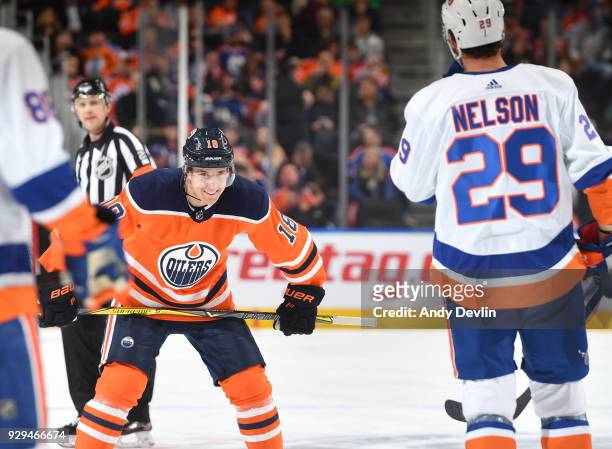 Ryan Strome of the Edmonton Oilers lines up for a face off against Brock Nelson of the New York Islanders on March 8, 2018 at Rogers Place in...
