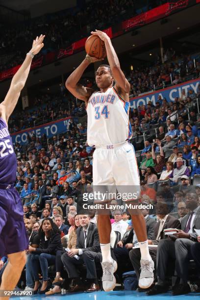 Josh Huestis of the Oklahoma City Thunder shoots the ball during the game against the Phoenix Suns on March 8, 2018 at Chesapeake Energy Arena in...