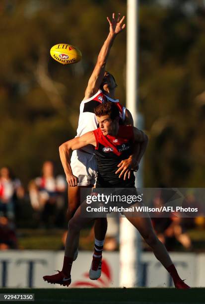 Shane Savage of the Saints and Bayley Fritsch of the Demons in action during the AFL 2018 JLT Community Series match between the Melbourne Demons and...