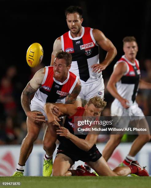 Tim Membrey of the Saints and Josh Wagner of the Demons compete for the ball during the AFL 2018 JLT Community Series match between the Melbourne...