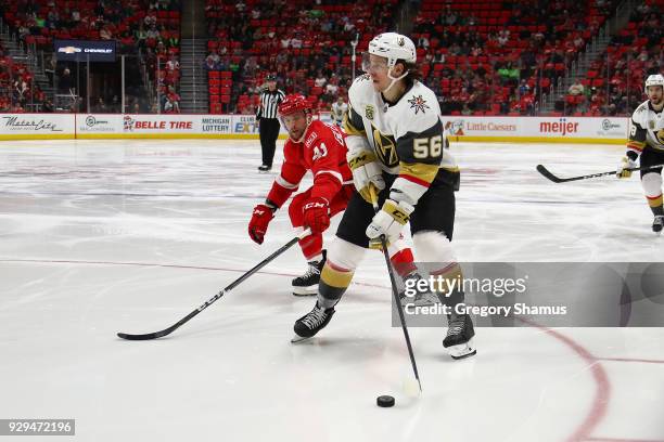 Erik Haula of the Vegas Golden Knights looks to get a shot in front of Luke Glendening of the Detroit Red Wings during the third period at Little...