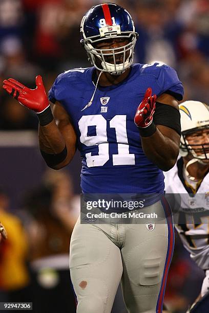 Justin Tuck of the New York Giants celebrates a tackle against the San Diego Chargers on November 8, 2009 at Giants Stadium in East Rutherford, New...