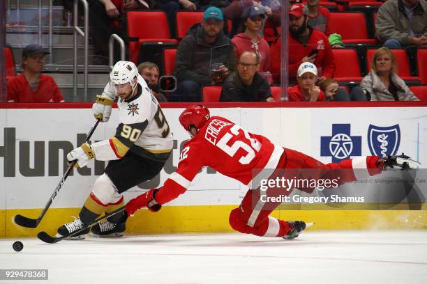 Tomas Tatar of the Vegas Golden Knights tries to avoid the stick of Jonathan Ericsson of the Detroit Red Wings during the third period at Little...