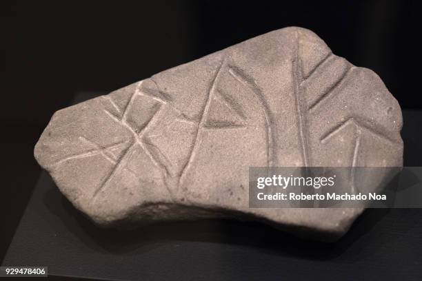 The Viking's objects: Whetstone with rune carving. The Vikings were Norse people who raided and traded across wide areas eastern and western Europe,...