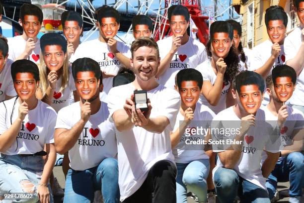 Olympian Matthew Mitcham proposes to Bruno Mars with an Affinity Diamond ring duritng a flash mob proposal at Luna Park, Sydney Harbour on March 9,...