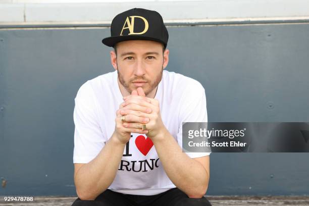 Olympian Matthew Mitcham poses ahead of a flash mob proposal with Affinity Diamonds at Luna Park at Sydney Harbour on March 9, 2018 in Sydney,...