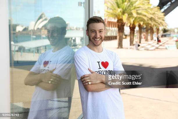 Olympian Matthew Mitcham poses ahead of a flash mob proposal with Affinity Diamonds at Luna Park at Sydney Harbour on March 9, 2018 in Sydney,...