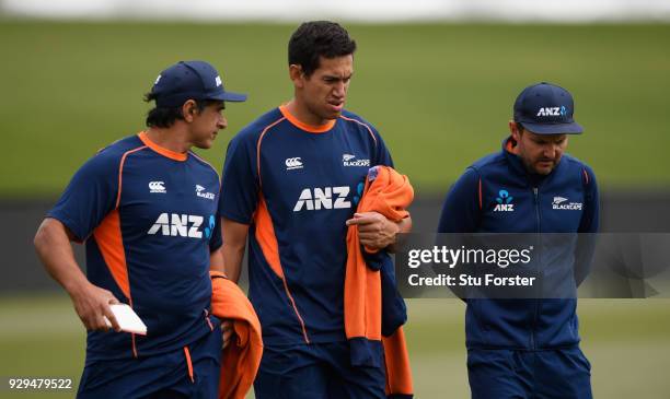 New Zzealand batsman Ross Taylor chats with coach Mike Hesson and physio Tommy Simsek after a fitness test ahead of the 5th and final ODI against the...