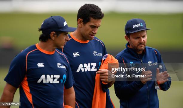 New Zzealand batsman Ross Taylor chats with coach Mike Hesson and physio Tommy Simsek after a fitness test ahead of the 5th and final ODI against the...