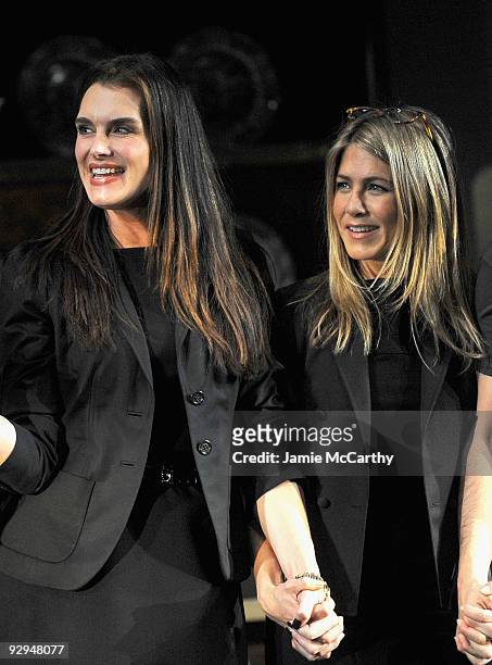 Actors Brooke Shields and Jennifer Aniston take a bow at the 9th Annual 24 Hour Plays Curtain Call presented by Montblanc at the American Airlines...