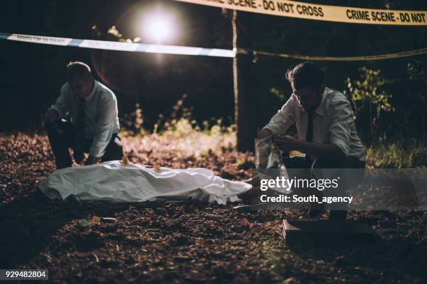 two detectives on crime scene - dead female bodies stock pictures, royalty-free photos & images