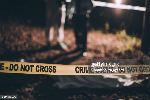 do not cross - crime tape stock pictures, royalty-free photos & images