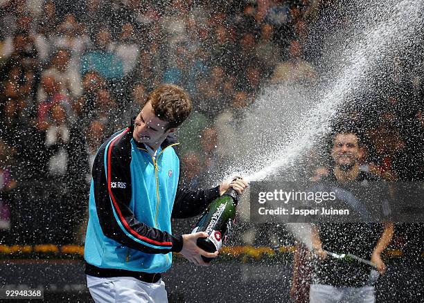 Andy Murray of Great Britain sprays champagne celebrating his win over Mikhail Youzhny of Russia in the final of the ATP 500 World Tour Valencia Open...