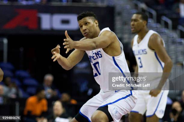 Jalen Johnson of the Saint Louis Billikens reacts after making a three point basket against the George Washington Colonials in the second round of...